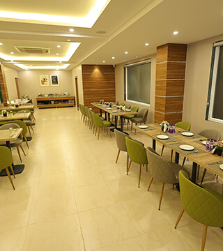  dining area at Sharda Residency restaurant