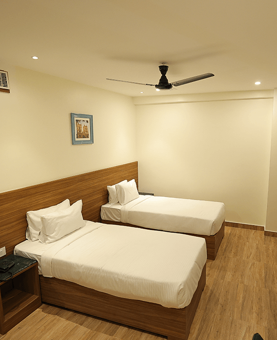 Deluxe room with premium amenities at Sharda Residency