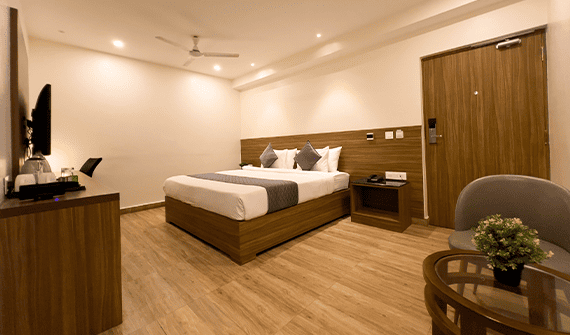 Executive room with modern furnishings at Sharda Residency