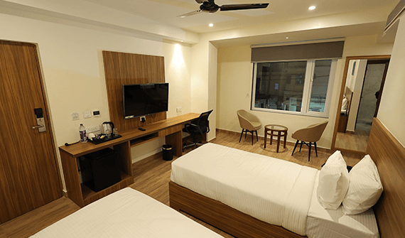 Well-appointed premium room at Sharda Residency