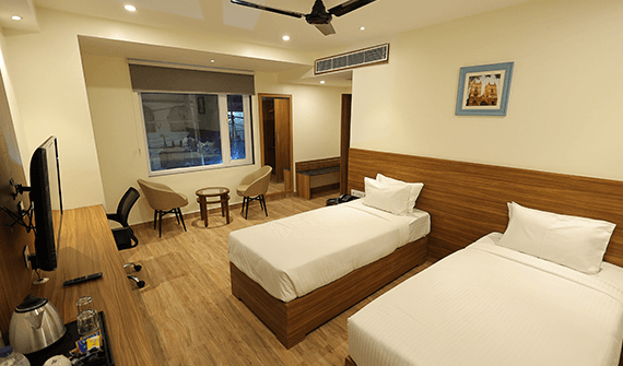 Premium room with luxurious furnishings at Sharda Residency